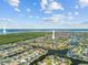 Aerial view of a waterfront neighborhood with multiple canals, homes, and views of the gulf at 2719 Mayaguana Ct, Punta Gorda, FL 33950