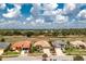 Beautiful one-story home with a neutral color scheme, well-manicured landscaping and attached two car garage at 2913 Royal Palm Dr, North Port, FL 34288