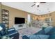 Comfortable living room with open access to the kitchen and bar seating at 2913 Royal Palm Dr, North Port, FL 34288