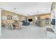 Open-concept living space with dining area, living room, and kitchen, ideal for entertaining at 2913 Royal Palm Dr, North Port, FL 34288