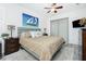 Bedroom features soft carpet, ceiling fan and neutral color scheme at 2913 Royal Palm Dr, North Port, FL 34288