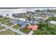 A waterfront neighborhood features houses along a canal system, with scenic views of a large lake at 3058 Curry Ter, Port Charlotte, FL 33981