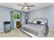 Comfortable bedroom with natural light and a soothing color palette at 3058 Curry Ter, Port Charlotte, FL 33981