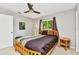 Bright bedroom with a view of nature through the window at 3058 Curry Ter, Port Charlotte, FL 33981