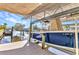 Boat dock featuring a boat lift and covered area for easy boat storage at 3058 Curry Ter, Port Charlotte, FL 33981