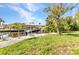 Backyard featuring a boat lift and dock, perfect for boating enthusiasts at 3058 Curry Ter, Port Charlotte, FL 33981