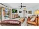 Cozy living room with a sliding glass door to pool and comfortable seating at 3058 Curry Ter, Port Charlotte, FL 33981