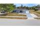 Charming single-story home with a well-maintained front yard and driveway leading to an attached garage at 3342 Avanti Cir, North Port, FL 34287