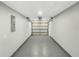 Spacious two car garage with high ceilings and an automatic garage door opener at 3342 Avanti Cir, North Port, FL 34287