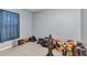 Bedroom featuring tile flooring and a window with curtains at 3647 Culpepper Ter, North Port, FL 34286