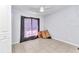 Bedroom featuring tile flooring, and a window with dark curtains at 3647 Culpepper Ter, North Port, FL 34286