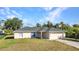 Well-maintained single-Gathering home featuring a new roof, manicured lawn, and attached garage at 3647 Culpepper Ter, North Port, FL 34286