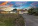 Charming single-story home with a two-car garage, lush lawn, and inviting curb appeal in a quiet neighborhood at 3647 Culpepper Ter, North Port, FL 34286