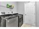 Practical laundry room with modern washer and dryer units for convenient chores at 3647 Culpepper Ter, North Port, FL 34286