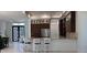 Stylish kitchen featuring granite countertops, modern appliances, and a breakfast bar with seating at 432 Gun Cay Ln, Punta Gorda, FL 33950