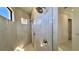 Luxurious walk-in shower with elegant tile work, dual shower heads, and modern fixtures at 432 Gun Cay Ln, Punta Gorda, FL 33950