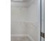 Walk-in closet with wire shelving and neutral walls at 4754 Caputo Ave, North Port, FL 34288