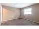 Bedroom boasting neutral walls, carpeted floors, and a bright window for natural light at 4788 Abadan St, North Port, FL 34287