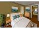 Cozy bedroom with natural light, carpet, and neutral décor at 4788 Abadan St, North Port, FL 34287