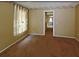 Bedroom with wood flooring and an ensuite bathroom at 4788 Abadan St, North Port, FL 34287