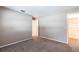 Bedroom boasting neutral walls, carpeted floors, and an open doorway to the home's closet at 4788 Abadan St, North Port, FL 34287