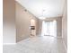 Dining room featuring neutral walls, tile flooring, and easy access to the kitchen at 4788 Abadan St, North Port, FL 34287