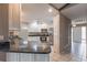 Bright kitchen features granite countertops, stainless steel appliances, and white cabinets at 4788 Abadan St, North Port, FL 34287