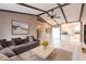 Spacious living room with beamed ceiling and neutral color palette at 4788 Abadan St, North Port, FL 34287