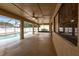The screened patio features ceiling fans and a view of the pool area at 4788 Abadan St, North Port, FL 34287
