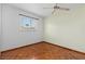 Bedroom with hardwood floors, a ceiling fan, and natural light at 485 Dorchester St, Port Charlotte, FL 33954