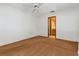 Bedroom with an open bathroom and dark colored carpeting at 485 Dorchester St, Port Charlotte, FL 33954