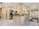 Stylish kitchen with stainless steel appliances, black countertops, and white cabinetry at 485 Dorchester St, Port Charlotte, FL 33954