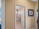 Bathroom features a tiled shower-tub, tile floors, and neutral paint at 5461 White Ibis Dr, North Port, FL 34287