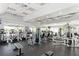 Bright gym with modern equipment, including treadmills, stationary bikes, and weight machines at 5461 White Ibis Dr, North Port, FL 34287