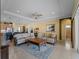 Spacious living room with tile flooring and neutral tones, perfect for entertaining or relaxing at 5461 White Ibis Dr, North Port, FL 34287