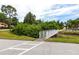 Inviting pathway across a small bridge that meanders through the lush landscaping at 6070 80Th N St # 215, St Petersburg, FL 33709