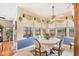 Cozy breakfast nook with large windows overlooking the backyard at 6242 Tropicaire Blvd, North Port, FL 34291