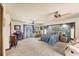 Spacious main bedroom with comfortable furniture, a ceiling fan, and natural light at 6242 Tropicaire Blvd, North Port, FL 34291