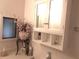 Bathroom featuring cabinet storage at 6832 Holo Ct, North Port, FL 34287