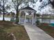 Charming gazebo overlooking the lake offers a relaxing retreat in a picturesque setting at 6832 Holo Ct, North Port, FL 34287