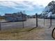 Secure parking area enclosed by a fence, providing safe storage for RVs at 6832 Holo Ct, North Port, FL 34287