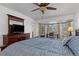 Bedroom with light colored floors and a bay window offers lots of natural light at 732 Santa Margerita Ln, Punta Gorda, FL 33950