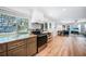 An airy kitchen with stainless steel appliances, granite countertops, and an eat-in area at 809 Kings Ct, Punta Gorda, FL 33950