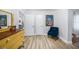 Bright living room with wood-look tile flooring and colorful decor at 809 Kings Ct, Punta Gorda, FL 33950