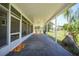 Spacious covered patio area with views of the backyard and neighboring properties at 809 Kings Ct, Punta Gorda, FL 33950