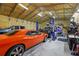 Large garage interior with car lifts and ample space for vehicle storage and workshop activities at 13297 Flaherty Ave, Port Charlotte, FL 33981