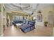 Spacious living room with tile flooring, large window, and coffered ceiling at 13297 Flaherty Ave, Port Charlotte, FL 33981