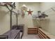 Well-organized walk-in closet with shelving, drawers, and ample storage space at 13297 Flaherty Ave, Port Charlotte, FL 33981