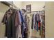 Spacious walk-in closet with clothing racks and a personal safe at 13297 Flaherty Ave, Port Charlotte, FL 33981