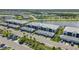 Aerial view shows community layout, landscaping, and nearby amenities at 14267 Heritage Landing Blvd # 1223, Punta Gorda, FL 33955
